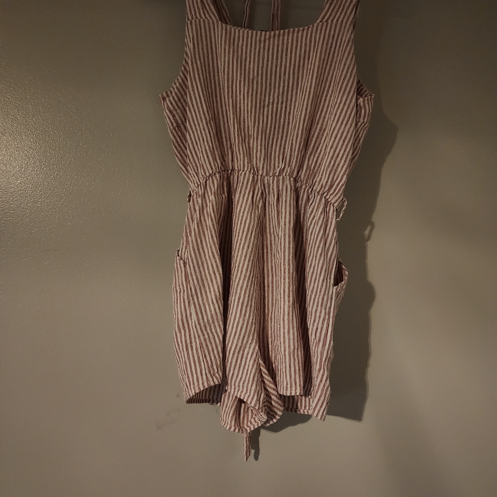 She + Sky small pink and white romper.